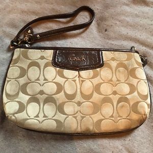 Coach wristlet. Minor stains.